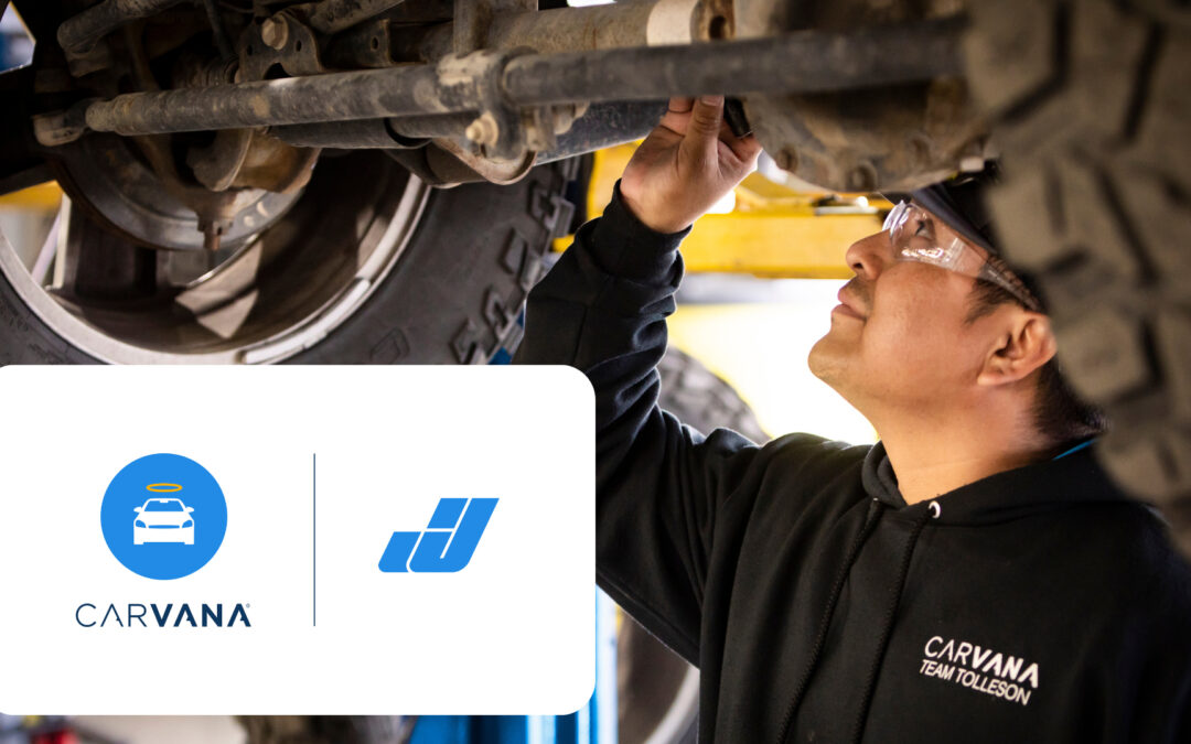 Carvana technician working on a car