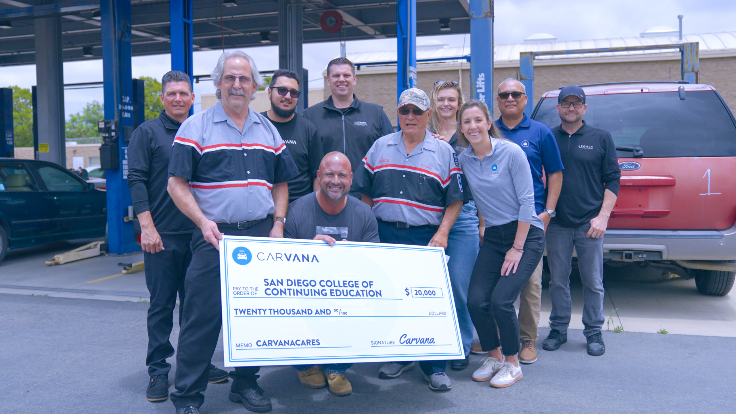 Carvana and Legacy Motor Club present a $20,000 CarvanaCarescares donation to San Diego College of Continuing Education's Auto Technology department.