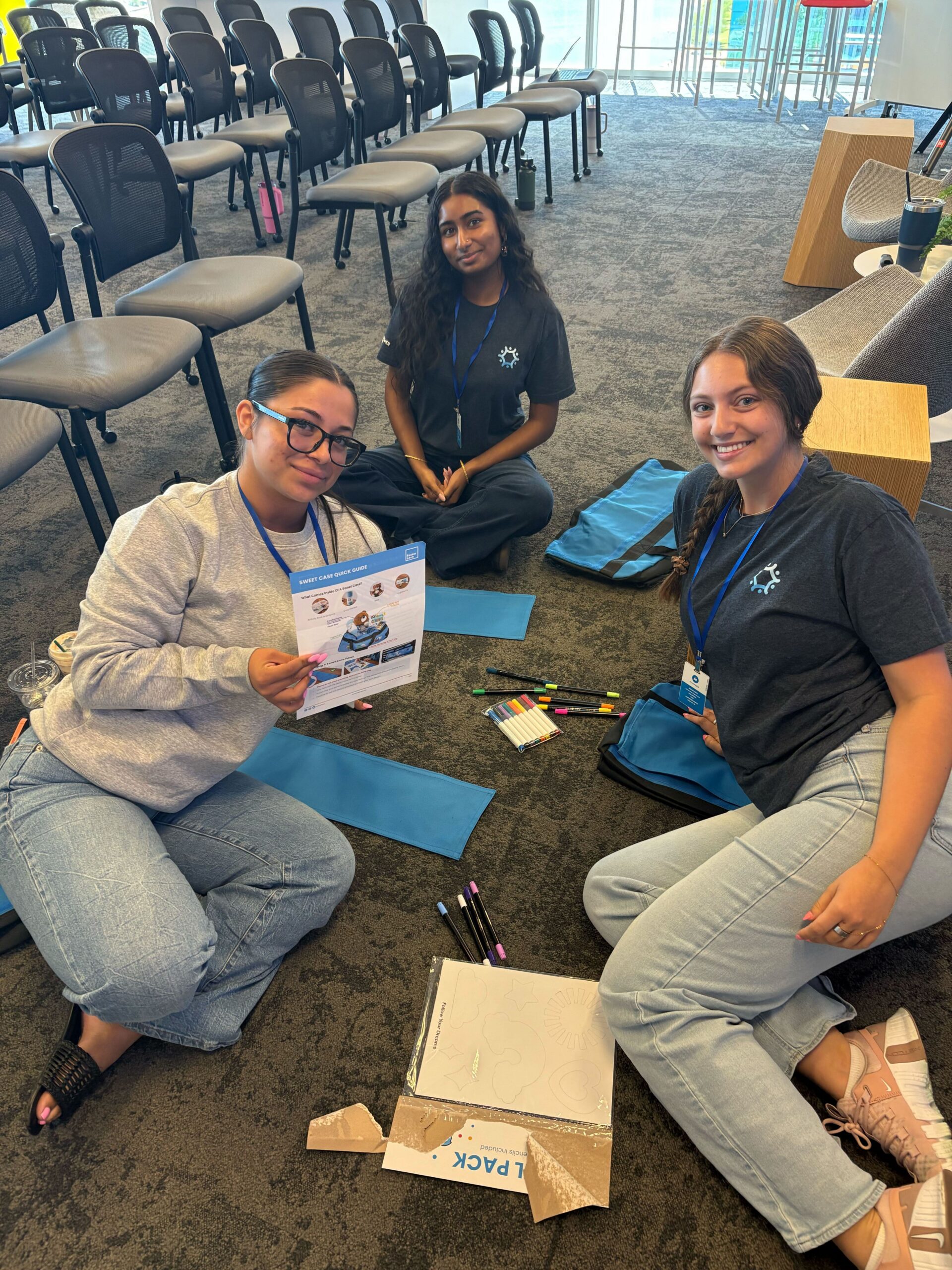 Carvana interns and team members working on a volunteer project to support foster children.