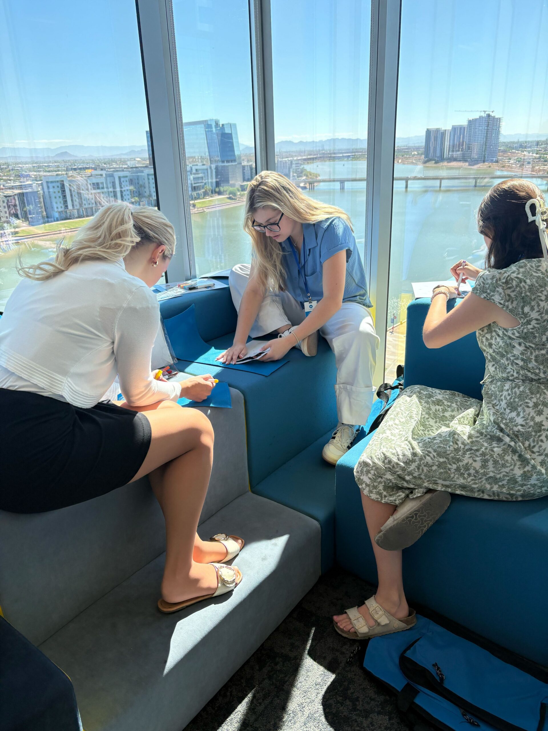 Carvana interns and team members working on a volunteer project to support foster children.