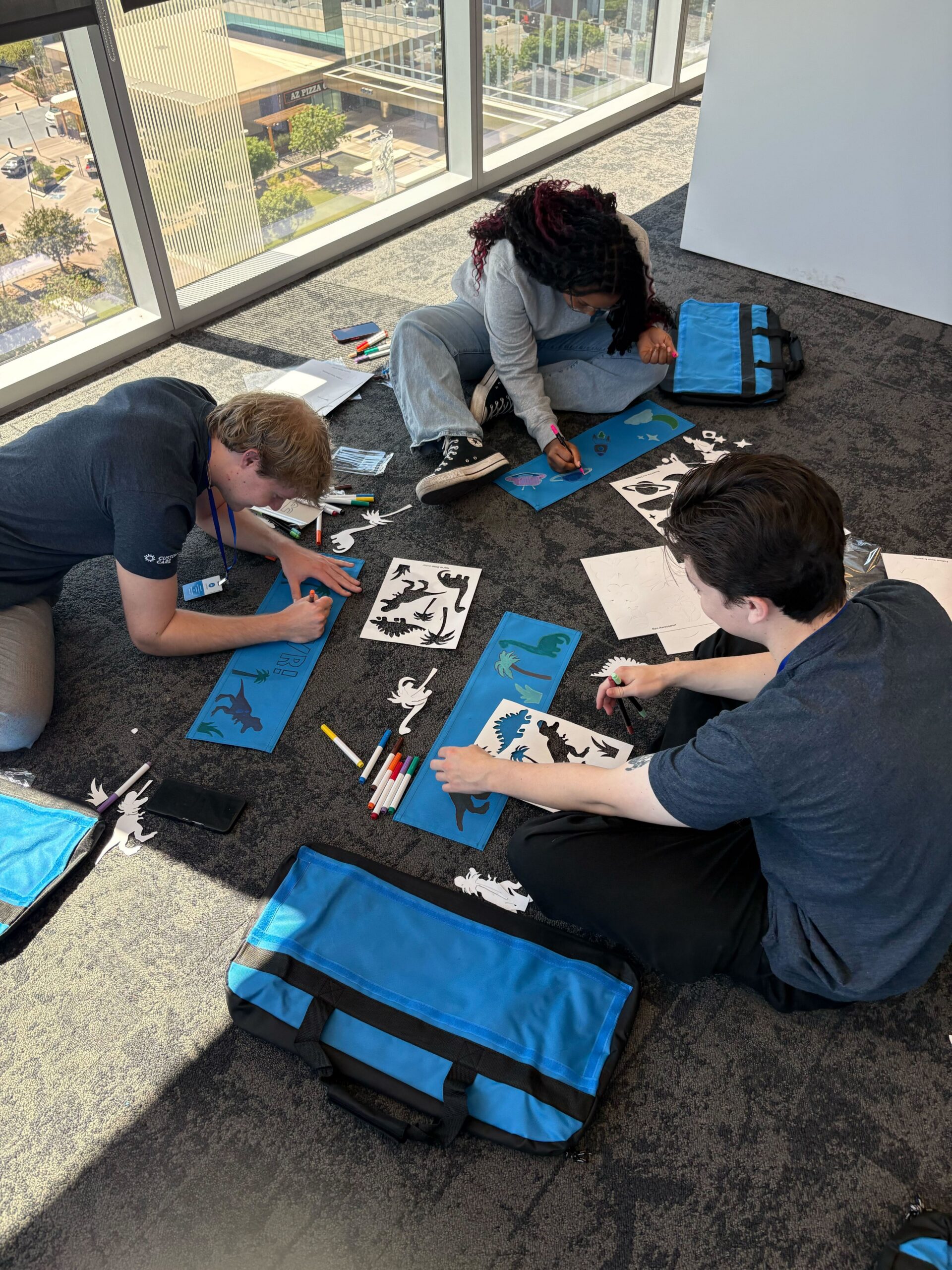 Carvana interns and team members working on a volunteer project to support foster children.